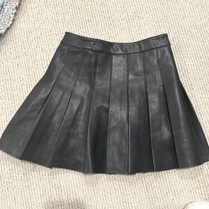 KatieJ NYC black faux leather pleated skirt